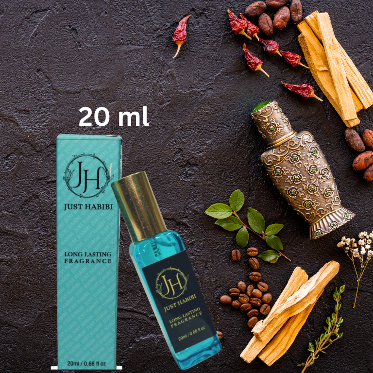 Just Habibi™ 20 ml perfume bottle and packaging on a dark surface with spices and leaves. aromatic oud.