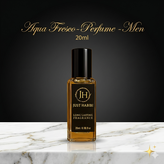 Just Habibi perfume bottle on a marble surface with a dark background