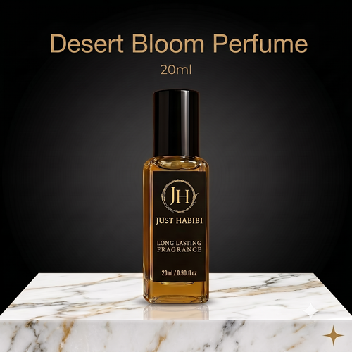 20ml bottle — describes the glass bottle, black cap, marble surface-Just habibi