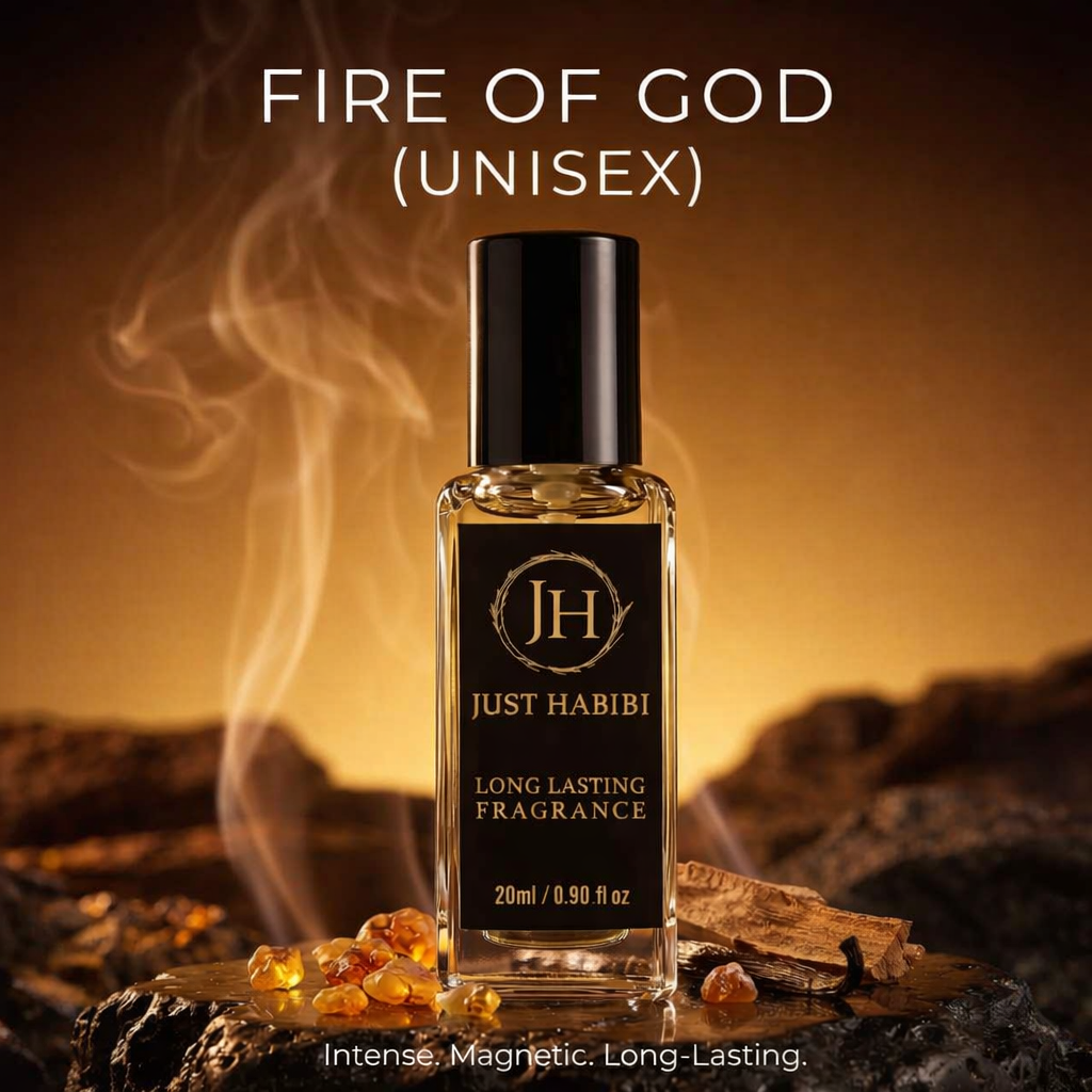 Perfume bottle labeled 'Fire of God (Unisex)' by Just Habibi with smoke effect and amber stones on a warm background.