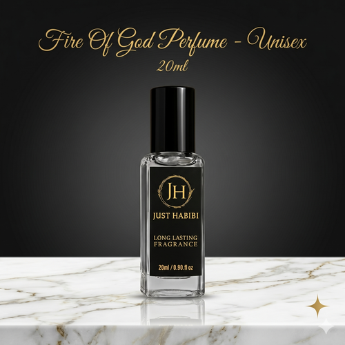 Perfume bottle labeled 'Just Habibi' on a marble surface with a dark background