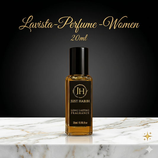 Perfume bottle labeled 'Just Habibi' on a marble surface with a dark background
