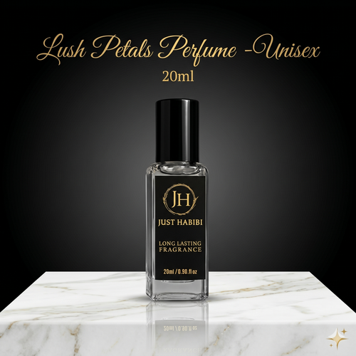 Perfume bottle labeled 'Just Habibi' on a marble surface with a dark background