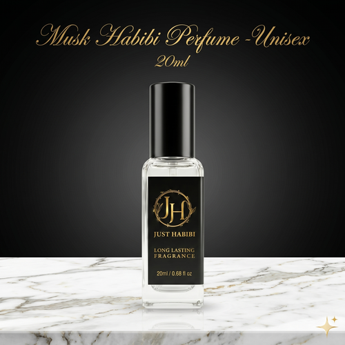 Perfume bottle labeled 'Just Habibi' on a marble surface with a dark background