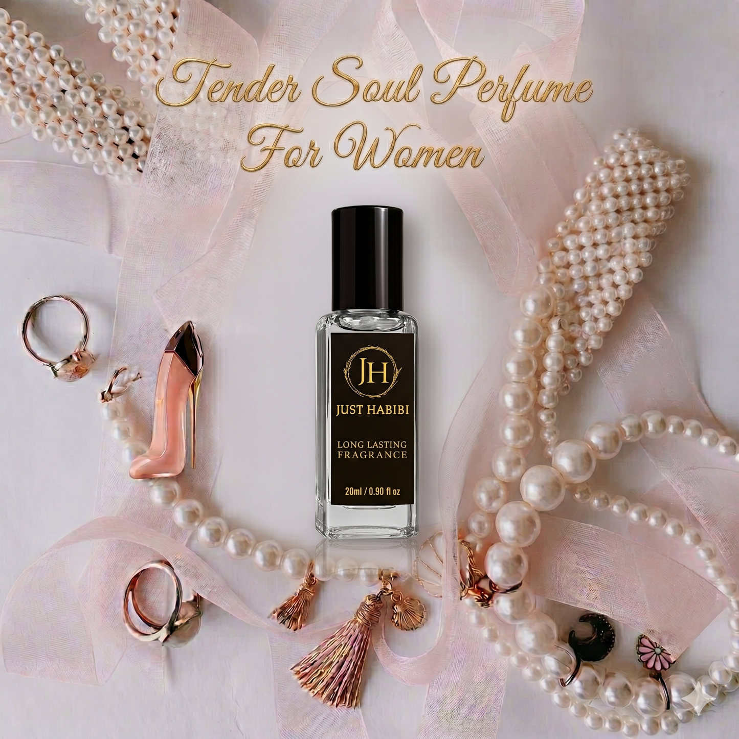 Perfume bottle labeled 'Just Habibi' surrounded by pearls and jewelry on a soft pink background.
